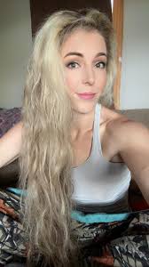 How to remove red hair dye from linoleum and tub?