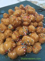 You can find struffoli (another name for pignolata)in perugia made with honey, sugar and candied fruits. Struffoli Neapolitan Honey Balls Italian Christmas Recipes Struffoli Recipe Italian Christmas Cookies