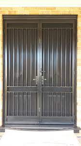 custom designed steel security double doors with stainless steel mesh and triple locks installed in bea steel security doors steel doors window grill design