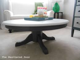 Painted Pedestal Coffee Table The Weathered Door White accent stitching adorns the base, while a sleek beveled glass.