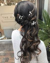 bridesmaid hairstyles side braided decorated with babies breath flowers event hair bride braid modern mens 2017