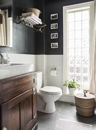 You still see the darker paint colors because some light is reflected off the surface. Look We Absolutely Love Dark Colors For The Bathroom Apartment Therapy