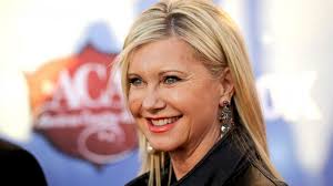 Olivia Newton-John Opens Up About Family's Painful Cancer Battles