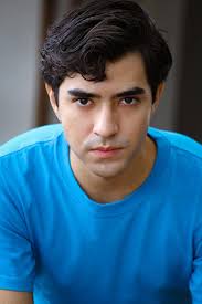 Hello, my name is Juan Fernando Rodas. I am a very tall man. My hair is  very curly. I am a little thin and I have brown skin. My eyes are brown