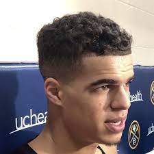 A curving line is shaved into the side of his faded haircut, accompanying an equally curvy, bright smile. Jordan Davis On Michael Porter Jr It S Like Watching 2k He S The Real Deal Denver Stiffs