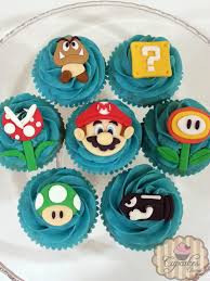 Cupcakes (pictured above) instead of a cake. 9 Mario Brothers Cupcakes Photo Mario Cupcake Ideas Super Mario Bros Cupcake Cake And Super Mario Bros Cupcake Cake Snackncake