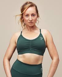 While wearing a bra that fits you well, stand in front of the mirror with a tape measure. The Best Sports Bra For Your Workout Gymshark Sports Bra Sizing And Fits Gymshark Central