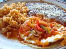 Heat the oil in a frying pan and add the onion, pepper, garlic and oregano. Huevos Rancheros Recipe Mexican Ranch Style Eggs Whats4eats