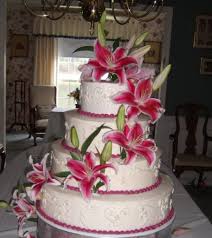 Cake With Stargazer Lilies So Beautiful Lily Cake Tiered Wedding Cake Amazing Wedding Cakes