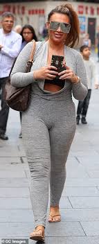 Check out amy wearing our irresistible beau mocha sleeveless lauren goodger daily mail online. Lauren Goodger Shows Off Her Incredible Curves In Grey Jumpsuit Daily Mail Online