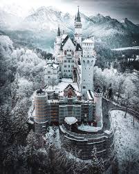 Aerial panorama of royal castle neuschwanstein in bavaria, germany deutschland. Neuschwanstein Castle During The Winter Nextfuckinglevel