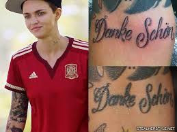 She had inked the word 'love' on the back of her ear. Ruby Rose S 48 Tattoos Meanings Steal Her Style Page 4