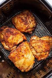 Place the chicken into the air fryer cooking basket and drizzle a little bit of oil on them. Air Fryer Chicken Thighs Super Crispy Low Carb With Jennifer