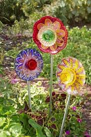Save Money On Fertilizers And Pesticides By Trying These Top Organic Gardening Ideas Want Additional Info Glass Garden Flowers Glass Garden Art Garden Art