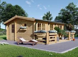 Blockbohlenhaus Und Blockhaus Aus Holz Online Kaufen In 2020 Blockbohlenhaus Dachschindeln Strandhauser