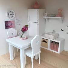 No dollhouse is complete without some miniature dollhouse furniture. Pretty Little Minis Square White Dining Table For Modern Dollhouse