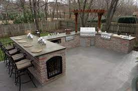 The larger your kitchen, the more carefully you will need to plan appliances in order to maintain a functional work triangle. U Shaped Outdoor Kitchen Created By Tulsa Patioscapes Outdoor Kitchen Patio Outdoor Kitchen Outdoor Kitchen Design