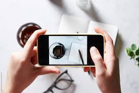 Maybe you would like to learn more about one of these? Person Taking Shot Of Notebook And Glass Of Coffee Using Mobile Phone By Marti Sans Cell Touchscreen