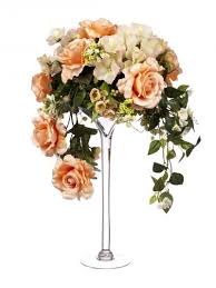 Durable plastic foliage and trees make ideal outdoor decorations, while more delicate foam or silk flowers are perfect for a small bunch of flowers to either walk down the aisle or to brighten a room in a vase. Artificial 60cm Coral Rose Coral And Cream Hydrangea And Mixed Foliage Displ Tall Flower Arrangements Large Flower Arrangements Artificial Flower Arrangements