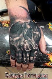 Skull with smoke tattoo done by ryan burke at necropolis tattoo. Darkside Tattoo Tattoos Realistic Black And Gray Skull On A Hand