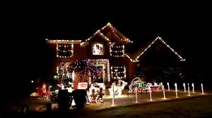 Christmas star (source unknown) 5 yardsticks, white spray paint, clear lights. Best Christmas House Decoration With Music Youtube