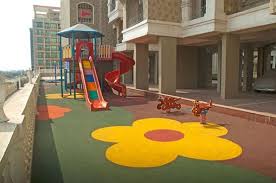 Outdoor Play Area With Rubber Playground Mats Flooring Ideas Floor Design Trends Playground Mats Rubber Mat Playground Playground Flooring