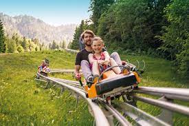 The developer for two new amusement rides in gatlinburg hired mhm to design a facility that could serve as a single entry point to both rides and act as a beacon to attract customers. Alpine Coaster Oberammergau Oberammergau