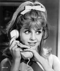 Johnny with Kelly Harmon (Mark Harmon's sister). Year unknown.