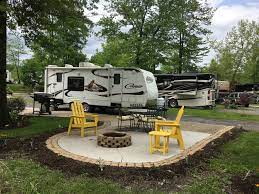 New Rv Patio Site With Signature Koa Yellow Deck Furniture At The Jonestown Hershey Ne Koa Journey Camping Places Camping Spots Campground