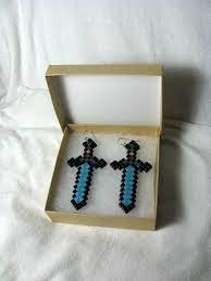 See full list on minecraft.fandom.com Minecraft Diamond Sword Earrings By Theclayspectrum On Etsy Minecraft Jewelry Weird Jewelry Funky Jewelry