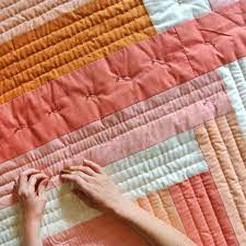 Check spelling or type a new query. How To Hand Quilt With Video Tutorial Suzy Quilts Hand Quilting Designs Hand Quilting Patterns Quilts
