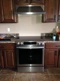 The oven is 5.3 cubic feet, and the cooktop has 5 heating elements. Samsung 5 8 Cu Ft Slide In Electric Range With Self Cleaning Dual Convection Oven In Stainless Steel Ne58f9500ss The Home Depot Stove Backsplash Kitchen Technology Flat Top Stove