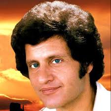 Who wrote “Si tu penses à moi” by Joe Dassin?