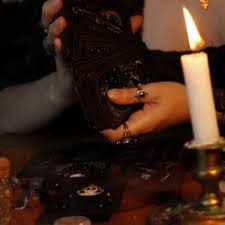 Serene psychic reading room with candles and crystals