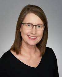 Dr. Kristin M. Comstock, MD