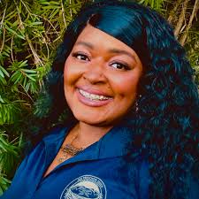The Alumni Service Award honors University of North Florida graduates who  exemplify integrity and make a lasting impact through volunteer service.  This year's recipient is Misline Brown ('24), a dedicated Family Advocate