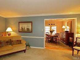 If you have a chair rail or wainscoting and you want to paint the top and bottom of the walls different colors, it's best to use the darker color on the bottom portion and the lighter on top. Chair Rail As Trim Above And Below The Same Home Aka House Master Bedroom
