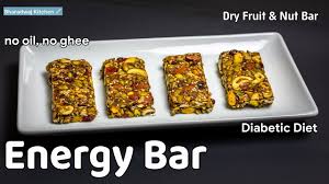 Next, add peanut butter, cocoa powder, protein powder, chocolate chips and the remaining 1/2 of the cashews. Energy Bar Recipe Dry Fruit And Nut Bars Diabetic Snack Recipes Vegan High Protein