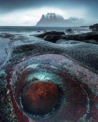 In the summer, the pale yellow color becomes more vibrant. As We Discover On Instagram Known As The Dragon S Eye In Lofoten This Spot Can Be Found At Uttakleiv Beach Would You Wanna Go Here And See This