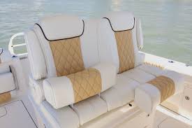 World Cat 295cc Individual Flip Up Bolsters And Flip Down Armrests Highlight The Comfort Features Of The Helm Seat Boat Upholstery World Cat Boat Interior