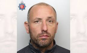 Man launched debris towards police officers at protest in Bolton