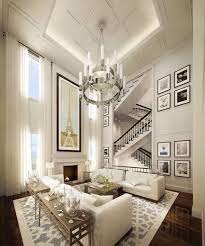 Great High Ceilings Lighting Wall Art Rug And Staircase Zigzagging In The Background With Images Hamptons Style Living Room Home White Family Rooms