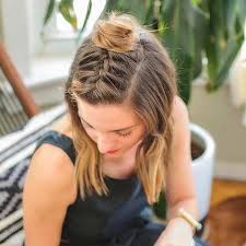 The hairdo is parted down the middle and in medium hair seems as if it was built to give you more style options than most other cuts, and with these coolest hairstyles for medium length hair. Half Up Braided Top Knot For Medium Length Hair Easybraidsformediumhair Down Hairstyles Medium Length Hair Styles Short Hair Top Knot