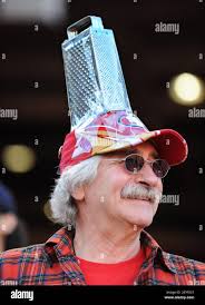 John Poulos, of Monterey, California, wears a cheese grater