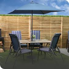 Table features ornamental scrolled designs. Garden Furniture Patio Sets The Range