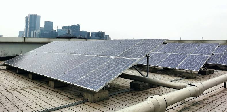 Roof ballasted solar systems
