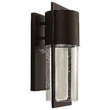 The fixture's focal point is its clear seedy glass, which acts as both a diffuser and shade for the internal lamping within. Hinkley Shelter Outdoor Wall Light Ylighting Com
