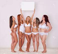 Girls In Underwear Peeking On Whiteboard Stock Photo, Picture and Royalty  Free Image. Image 32098697.