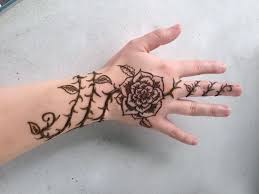 Every Rose Has Its Thorns Rose Hand Tattoo Henna Hand Tattoo Thorn Tattoo