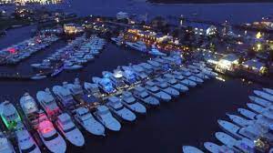 World class marina resort featuring two pools, fitness center, 3 bathhouses, working boatyard, wifi, restaurant, marine. The Fleet Sunset Marina In Ocean City Md At Night Youtube
